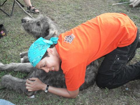 Susan showering an old dog with love